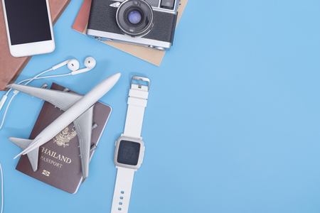 Travel objects on blue with copy space for text bannerの写真素材