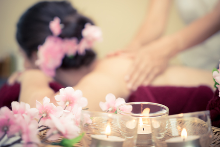 Spa candles and flower with Massage backgroundの写真素材