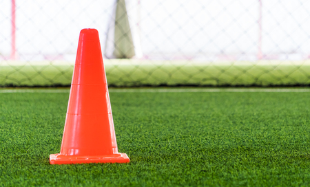 Soccer training cone on indoor soccer training groundの写真素材