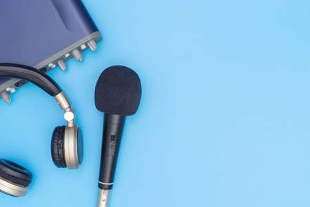 Microphone and music interface headphone on blueの写真素材