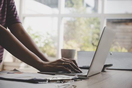 Office woman hand is typing on business computer