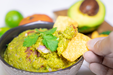 Japanese style serve of Maxian avocado guacamole with chips wasabiの写真素材
