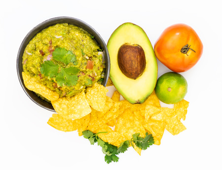 Guacamole Avocado with chips mexican food flat lay top view isolatedの写真素材