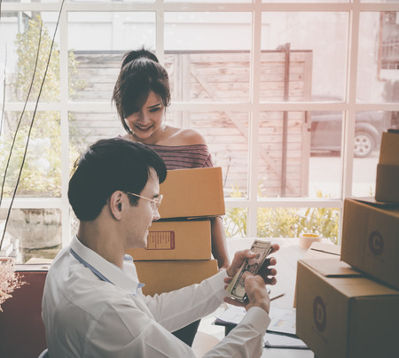 home Business team is checking stock in online home businessの写真素材