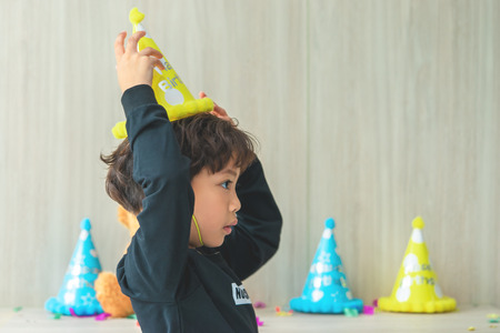 little boy is preparing his birthday partyの写真素材