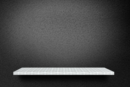 White Empty counter shelf on black background for product displayの写真素材