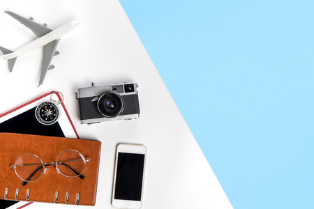 Travel objects and equipments on white top viewの写真素材