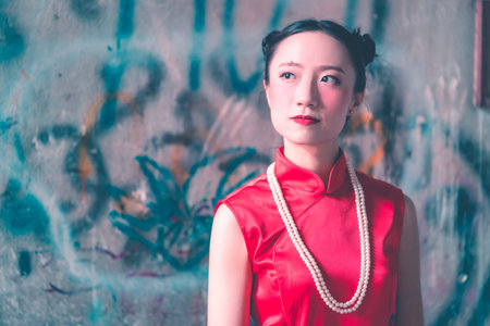 a portrait of Chinese woman wearing Chinese traditional Cheongsam