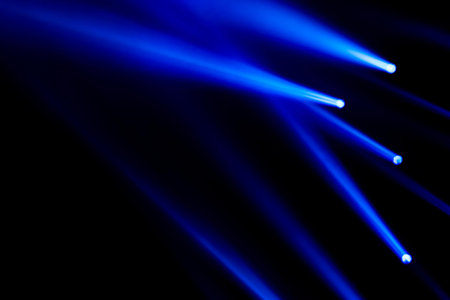 Blue light rays spotlight for show concert and night club concept. Abstract light line for background and backdropの写真素材