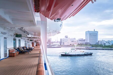Yokohama, Japan - 23 Sep 2019 : Side balcony of Diamond princess cruise ship with the view of Yokohama port in background.のeditorial素材