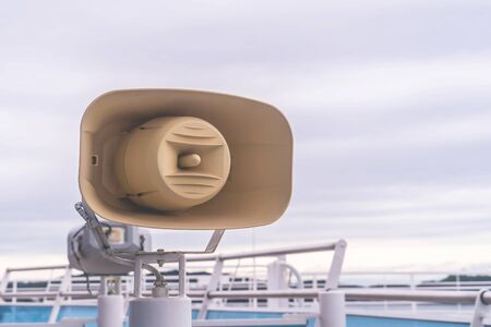 Megaphone Annoucement speak on a traveling ship ocean cruiseの写真素材