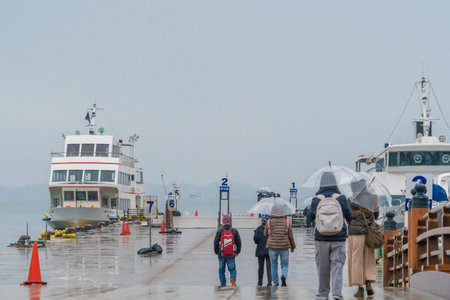Sendai; Japan - 30 Dec 2019: Tourists are getting on a sightseeing Boat that go around Matsushima...