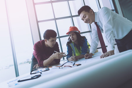 Success contractor team with engineer and architect having a successful meeting.