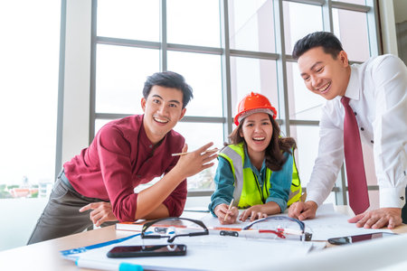 Success contractor team with engineer and architect having a successful meeting.