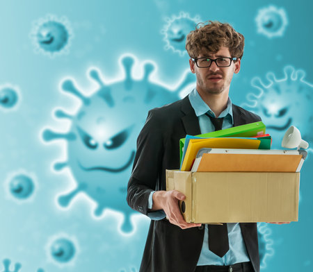 Unemployed Business man worker carrying a packed box with upset expression for unemployment concept by Covid 19 pandemicの写真素材