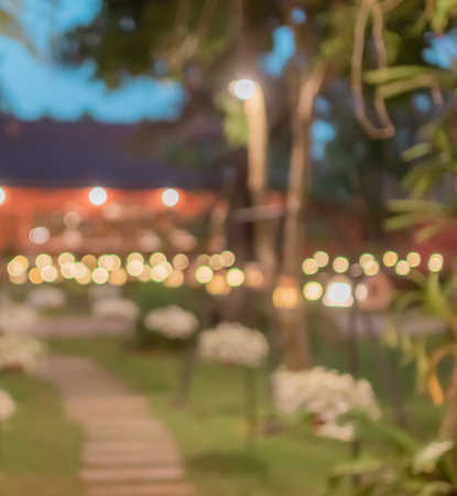 Outdoor restaurant decoration with light and tree in a romantic mood for background.の写真素材