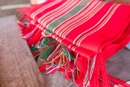 Thai and Asian Style Vintage textile thread machine to make traditional clothing and fabric pattern weaving.の写真素材