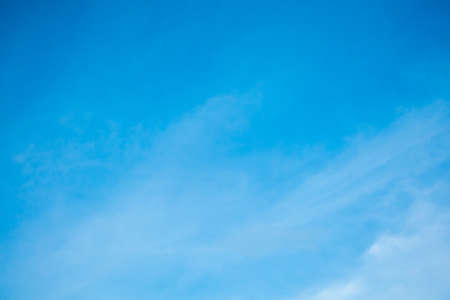 Bluesky with light cloud for background.の写真素材