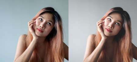 Two portrait comparing pretty Asian woman Before and after Digital image skin and beauty retouching side by side.の写真素材