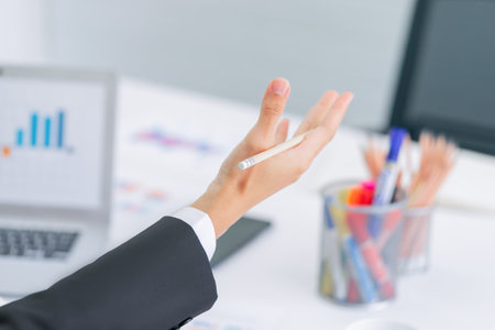 Closed up shot of a businessman hand explaining in office meeting room.