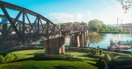 Kanchanaburi, Thailand - 20 April 2022 : People are crossing the historical bridge of World War 2 in River Kwai.のeditorial素材