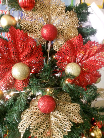 Colorful Christmas decorations flowers and ballsの素材