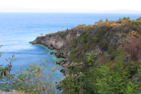 Rocky hill and Oceanの写真素材