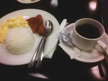 Breakfast meal with coffee on the table.の写真素材