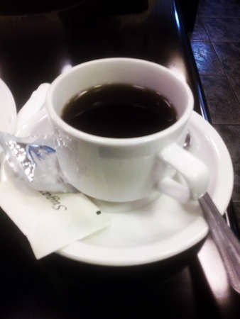 Black coffee on the tableの写真素材