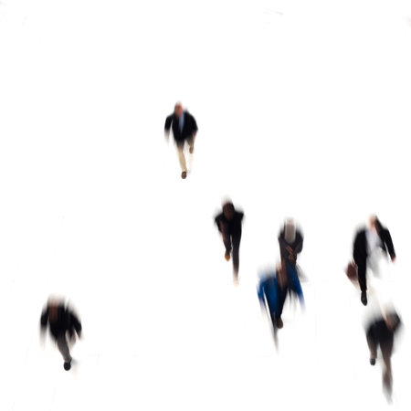 A crowd of isolated blurred people walking on white background