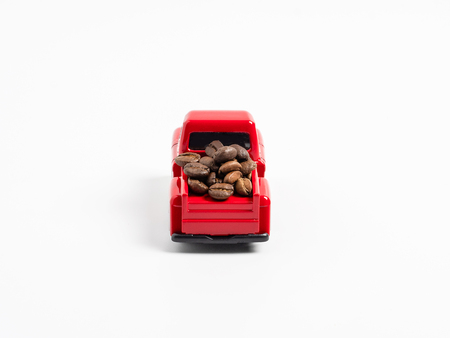 coffee bean on red truck, pickup, on white background, concept delivery coffee bean and transportation.の写真素材