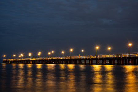 Pier at night on the Black Sea in Sochi, Russia.の写真素材