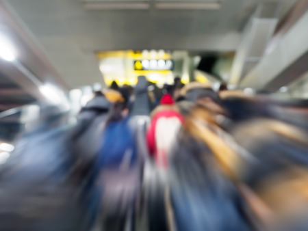 Defocused image of city business people crowd abstract blur motionの写真素材