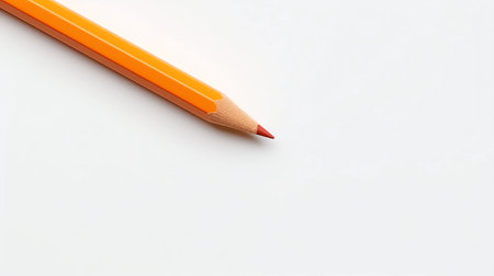 Orange pencil isolated on white background with copy space for your text.の素材