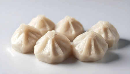 chinese steamed dumpling on a white background close-upの素材