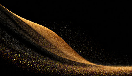 Golden particles stream elegantly across a black background, forming a flowing waveの素材