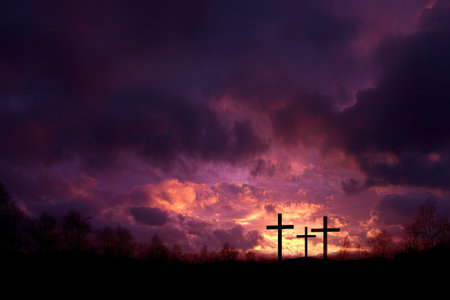Three crosses stand silhouetted against a dramatic sunset. The sky displays deep purple and orange hues, with textured cloud formations. The overall composition suggests a spiritual theme. Suitable for illustrations, backgrounds, or designs relating to faith or symbolism, offering versatile commercial applications.の素材