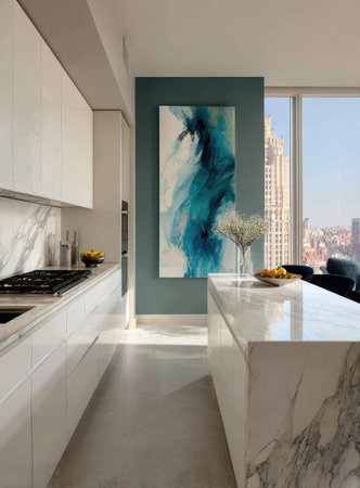 A contemporary kitchen features a white countertop island and cabinets, complemented by a teal accent wall displaying abstract art. Natural sunlight streams through large windows, illuminating the space. The interior design combines clean lines with textured elements. Suitable for architectural, lifestyle, or home decor projects.の素材