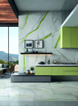 This image features a modern kitchen interior with bright green cabinetry and a marble-like patterned wall. The space utilizes natural light, highlighting the clean lines and contemporary design. The composition could be used for advertising purposes related to interior design, home renovation, or architectural concepts. It also evokes a sense of tranquility.の素材