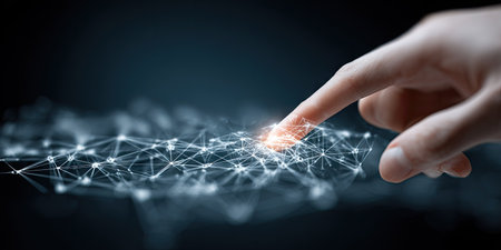 A close-up showcases a finger interacting with a glowing digital network. The image features shades of blue and a network of connected points. It conveys technological advancement and connectivity, potentially for commercial applications related to data, communication, and innovation.の素材