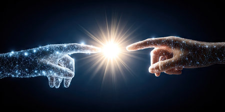 Two hands, one rendered with glowing particles, extend toward a radiant light source. The image features cool blue and warm yellow hues against a dark background. The composition suggests connection and innovation. It is appropriate for various commercial and editorial projects related to technology, communication, or concepts of creation.の素材