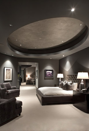 This image showcases a luxurious bedroom with a focus on modern interior design. The room features a neutral color palette, with dark walls and light flooring. Various light fixtures illuminate the space, accentuating the furniture and architectural details. The image could be used for editorial content or commercial projects related to interior design and home decor.の素材