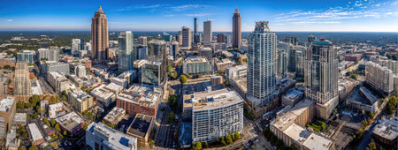 An elevated perspective reveals a sprawling cityscape filled with numerous skyscrapers. The image showcases diverse architectural styles, with reflective glass and varied colors. The bright day suggests commercial applications for business or real estate presentations. The composition highlights the complexity and scale of the urban environment.の素材