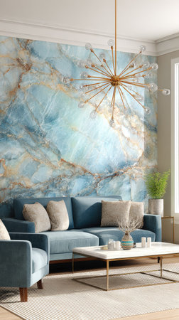 A modern living room showcases a blue sofa set against a patterned, artistic wall. The interior features a neutral-toned rug, a white coffee table, and a golden chandelier, creating a stylish and welcoming atmosphere. This image is suitable for home decor websites, interior design articles, and promotional materials.の素材