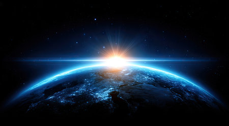 A detailed view of planet Earth from space shows a vibrant blue atmosphere and city lights. The composition features a bright golden sun, emanating beams of light, and an ocean illuminated below. It is a digitally created illustration suitable for various conceptual, scientific, and commercial projects.の素材
