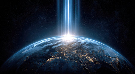 An illuminated Earth from space is highlighted by an otherworldly light beam extending down. The image displays textures with shades of blue, gold, and black. The composition is dramatic with an overhead view. This visual can be used in multiple science, technology, and abstract design projects.の素材