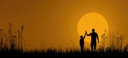A silhouette captures a father and child giving a high five under a large sun. The scene employs a gradient of warm colors, and the figures are outlined against the bright backdrop. The overall composition creates a sense of connection, suitable for illustrations, design projects, or commercial uses.の素材