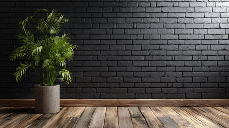 A lush green potted plant stands before a textured dark brick wall and a wooden floor. The composition utilizes natural light. This image is suitable for various commercial applications, including home decor projects, background illustrations and conceptual designs.の素材