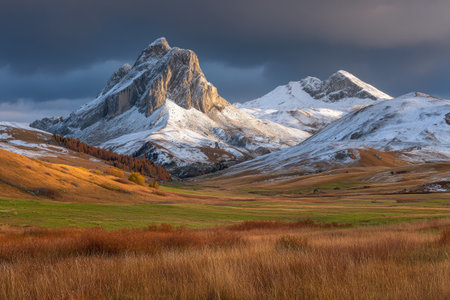 Autumn alpine landscape with snow-capped peaks in the Dolomites, Italyの素材