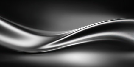 A dynamic composition presents a flowing wave in shades of silver, contrasted against a dark backdrop. The image showcases smooth textures and subtle lighting effects, conveying a sense of movement. Ideal for various commercial applications, it can be used for website backgrounds or promotional materials.の素材